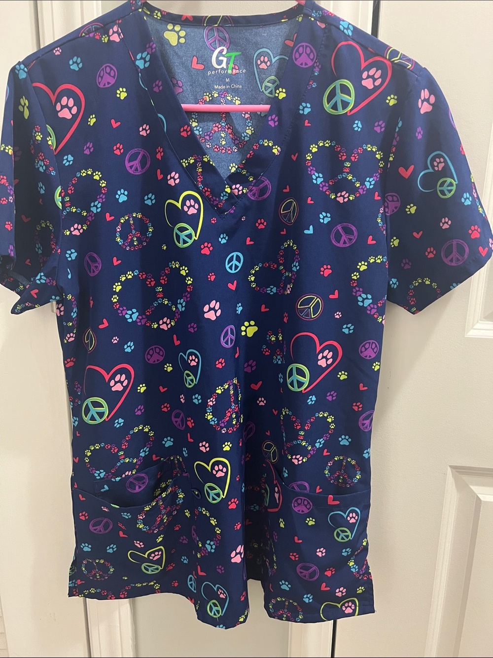 GT Performance Navy Scrub Top with Colorful Hearts & Paw Prints